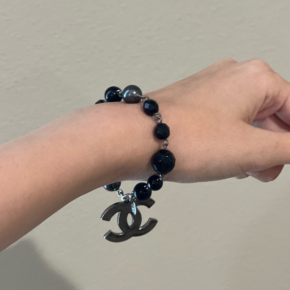 CHANEL black pearl charm bracelet